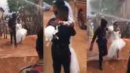 Ghanaian Fire Service wedding goes viral as couple get 'flooded' with water by colleagues