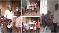 Reactions as man stuns lady who delivered twins, drives her home after paying hospital bills, splashes cash