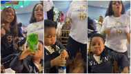 Little boy with '30 BG' chain on his neck drinks Star Radler at event, dances with ladies, video stuns many