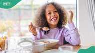 Funny young kid asks for water and milk shortly after eating, appears wiser than her age