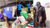 4 good things people did during festive season to make many smile, 1 Nigerian policeman gave out bags of rice