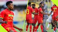 Otto Addo runs to the pitch to celebrate with Ghana striker after debut goal