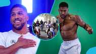 Anthony Joshua jumps on a power bike after landing in Ghana for Sharaf Mahama's boxing event: Video