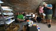 Far from home, Russian exiles help Ukrainian refugees