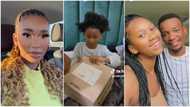 "God protect this man": Single Ghanaian mum rejoices as boyfriend bonds with her daughter, buys kid big box of gifts