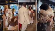 Lady flies lover's mother down for their bridal shower, man becomes emotional, hugs her tight in video