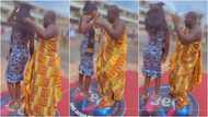 Ghanaian man creates scene on school campus, dances with daughter on graduation day to Terminator song