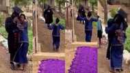 Poor mum who could not afford graduation gift for son lays her cloth on floor for him