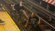 Heroic bystander saves life of disabled man who fell on train tracks with wheelchair, video pops up