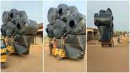 Keke rider makes people shiver as he uses his tricycle to carry 6 tanks in video; many can't believe their eyes