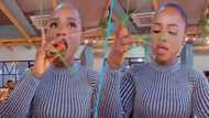 “She coped flawlessly”: Peeps react as pretty lady eats fries and chicken with long nails in video