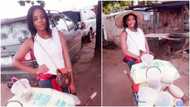 More sweet photos of the pretty graduate who sells food in a wheelbarrow pop online