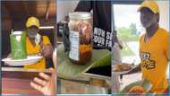 Reggie Rockstone rocks yellow outfit; serves customers waakye at his restaurant