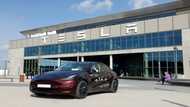 Tesla profits tumble but shares rise on new vehicle plan
