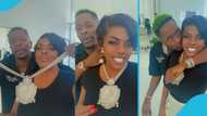 Shatta Wale kisses Nana Aba, places expensive SM chain on her neck, she blushes