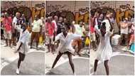 Pretty lady keeps legs apart, shows off sweet dance moves on street, people drool over her in video