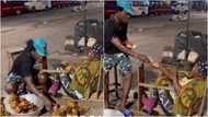 Young Ghanaian man buys out kenkey of old street hawker who was selling at midnight: "Go home and rest"