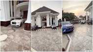 A TikToker shows off a stunning mansion in Africa that has many exotic cars parked in the compound