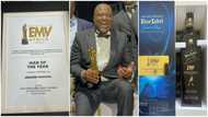 Ibrahim Mahama flaunts his awards, branded items and gifts from the EMY Africa awards