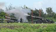 Taiwan holds military drill after China repeats threats