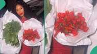 Lady gets bowl of expensive fresh pepper and vegetables bouquet as gift from her man