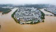 Hundreds of thousands evacuated in China after heaviest rains in decades