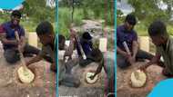 Ghanaian men pound fufu in a carved hole in a rock: “Everything is natural”