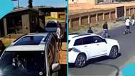 Mother defends against 4 armed suspects in viral driveway attack, sparks online praise