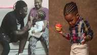 Rare throwback video of Stonebwoy kissing his first son Janam pops up