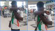 Ghanaian man cries at Kotoka airport as he readies to travel abroad, friend consoles him, video causes stir
