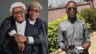 Young man celebrates getting called to the bar with his dad who is also lawyer