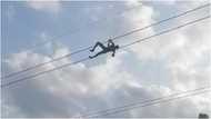 Walewale: Alleged mentally impaired man climbs and relaxes on high tension cables, video causes stir