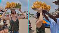 Obroni lady relocates to Ghana to hustle, hawks plantain chips in traffic