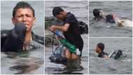 Smart young boy saves himself at sea as he swims with plastic bottles, emotional video breaks the internet