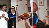 Ludacris happily munches on Ghana jollof in Sarkodie's mansion