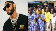 Usher Arrives in Ghana, Mobbed by Pupils as He Visits JHS in Accra