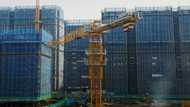 Chinese city lifts curbs on buying homes as property crisis bites