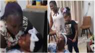 Woman rolls on floor in emotional video as daughter arrives from US after 10 yrs
