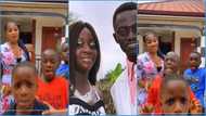 Lil Win's wife bonds with step children in cute video; Ghanaians hail her