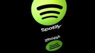 Spotify swings to profit, paying subscribers rise