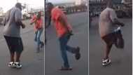 2 men show powerful dancing skills on the road; video heats social media; many react