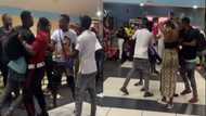 Man makes lady publicly remove everything he bought for her after seeing her with another man