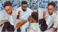 Sarkodie spends quality time with his look-alike son in videos; fans go gaga: “Beautiful boy”