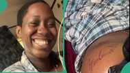 Lady in love tattoos boyfriend's name on her body, video goes viral online