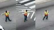 He's doing the most - Many say as energetic officer conducts traffic with serious dance moves in the middle of the road