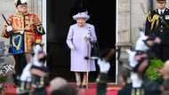 Queen's coffin heads to Scottish palace, historic church