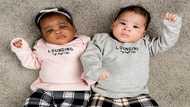 Happy mum gives birth to twins with different skin colour