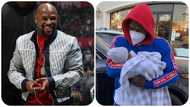 Floyd Mayweather spotted rocking grandchild in his arms for the 1st time in stunning photos