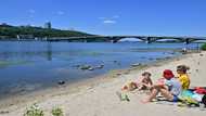 Ukrainians look to Kyiv beaches as respite from war