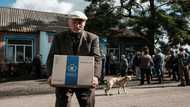 War leaves Ukraine farming village queueing for food